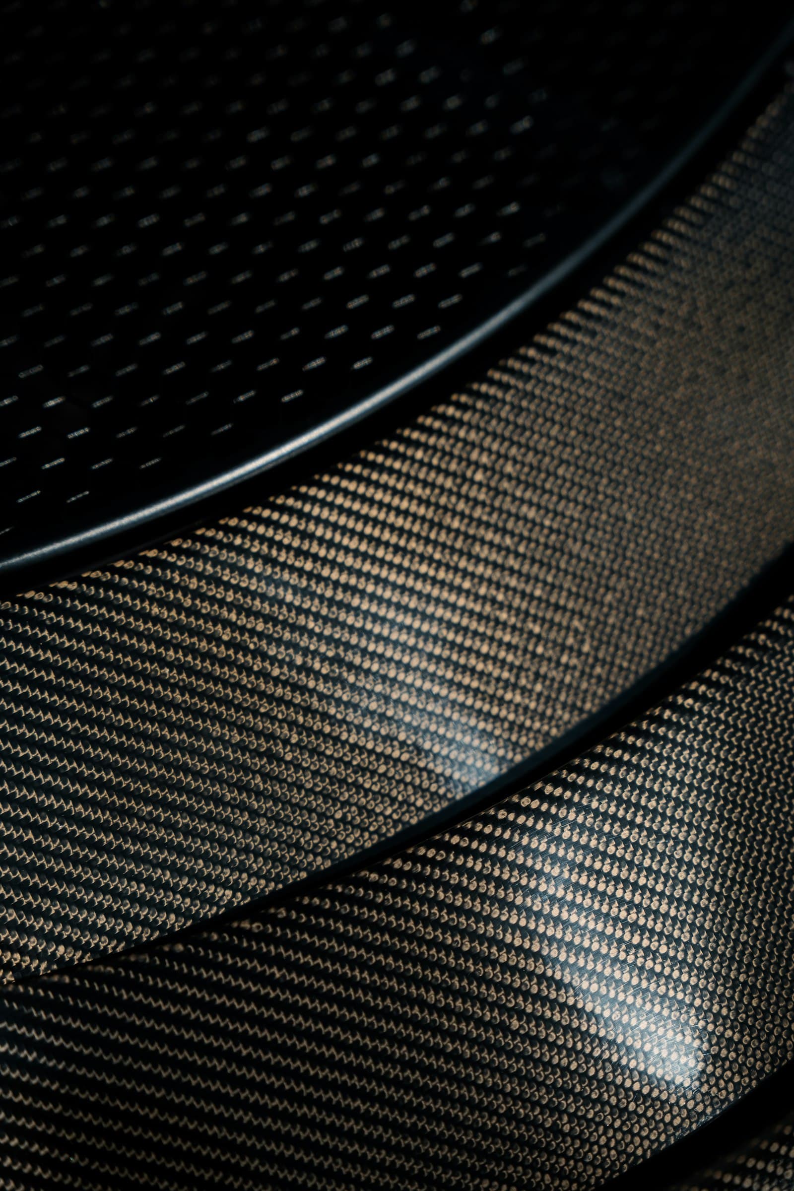 Close-up of woven carbon fiber texture