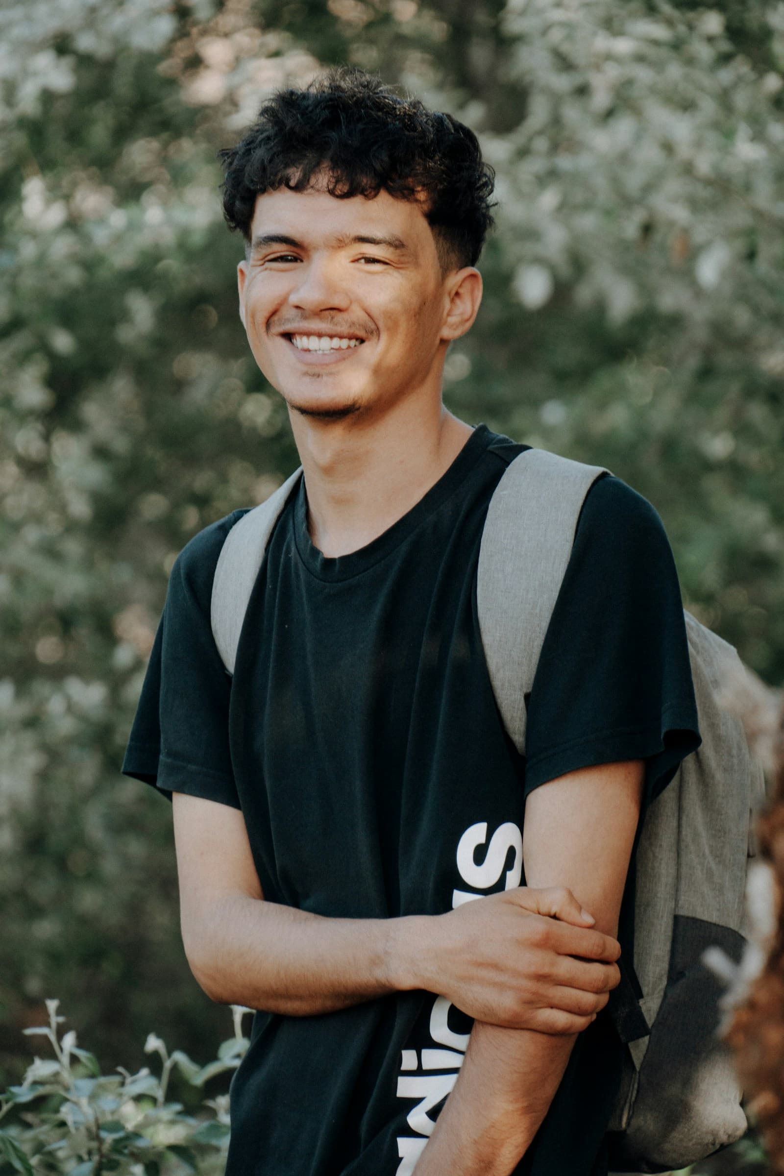 Fictional student Marcus Rivera represented by a smiling college-age man